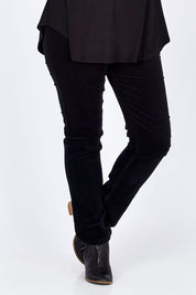 Model Jess wearing size 14 of the Pin Cord Slim Pant in colour Black (Black), from the front, cropped image