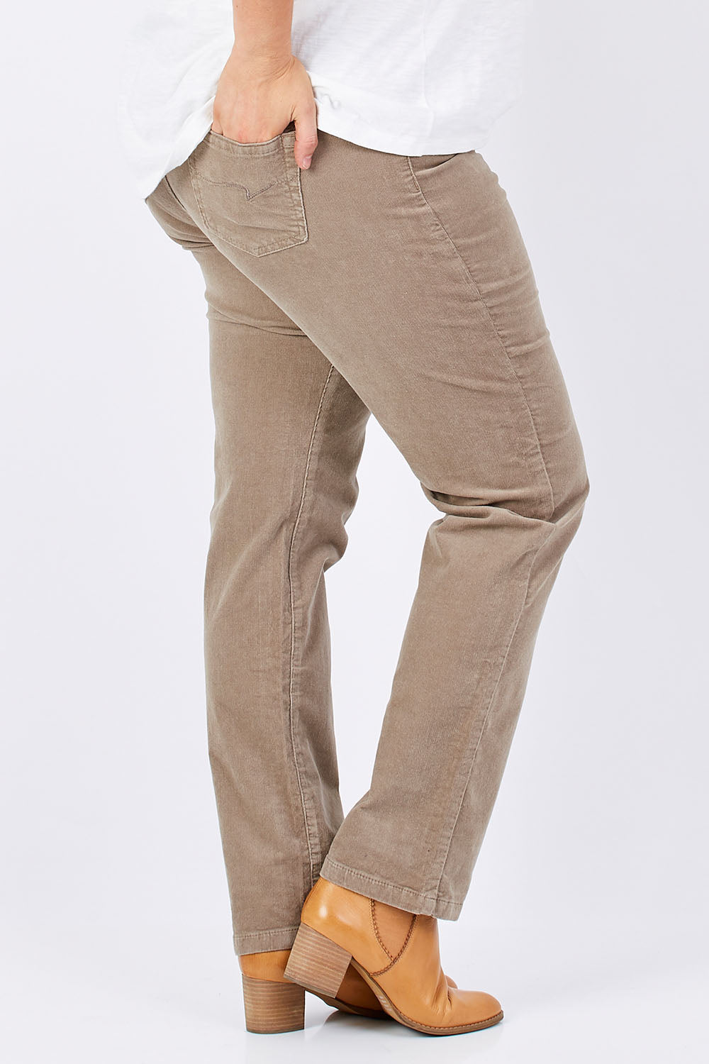 Model Mae wearing size 16 of the Pin Cord Slim Pant in colour Stone, from the back