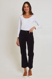 Model Madeline wearing size 10 of the Wide Leg Ankle Grazer Pant in colour Black (Black), from the front, showing the whole outfit