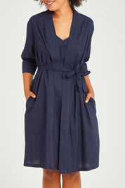 Model Olivia wearing size S of the Bamboo Cotton Kimono Robe in colour Navy (Blue), from the front, cropped image