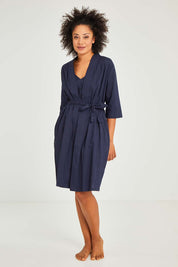 Model Olivia wearing size S of the Bamboo Cotton Kimono Robe in colour Navy (Blue), from the front, showing the whole outfit