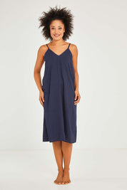 Model Olivia wearing size S of the Bamboo Cotton Strappy Nightie in colour Navy (Blue), from the front, showing the whole outfit