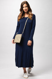 A model wearing the Long Sleeve Maxi in colour Navy (Blue), from the front, showing the whole outfit