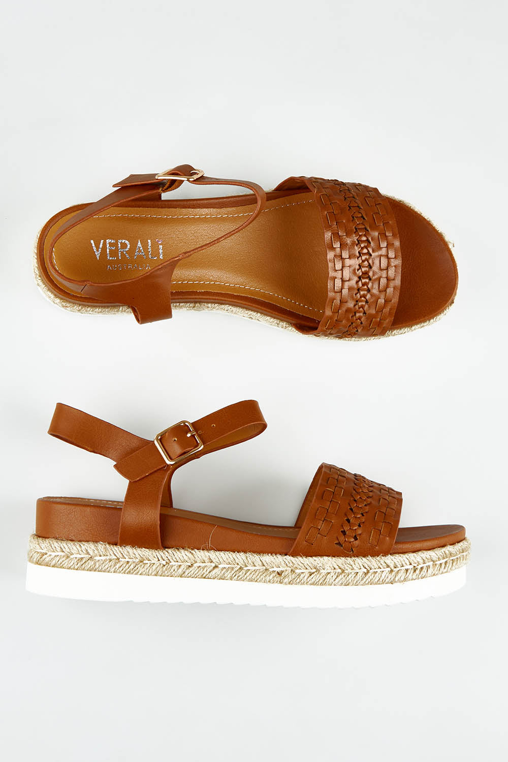 A model wearing size 37 of the Disco Woven Flatform Sandal in colour Tan, from the front, showing the whole outfit