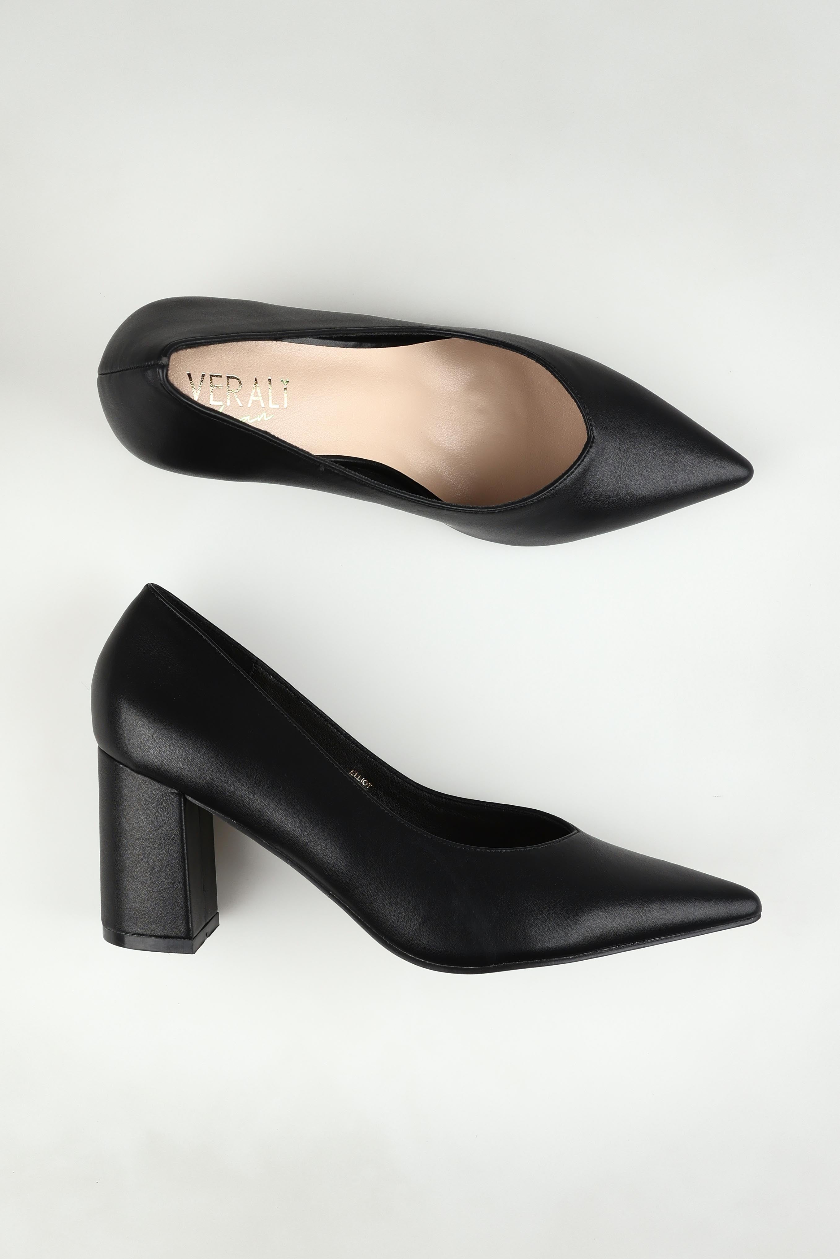 A model wearing size 37 of the Elliot Block Heel in colour Black (Black), from the front, showing the whole outfit