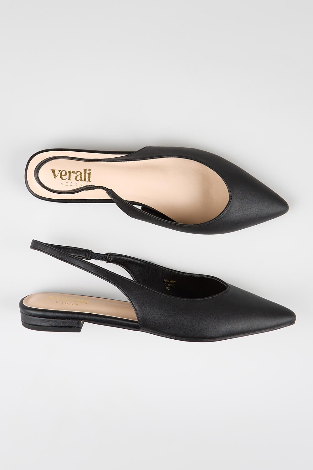 Model Genericm wearing size sample of the Hillary Slingback Flat - Black in colour Black, in a cropped view