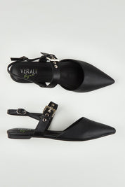 A model wearing size 37 of the Idaho Ballet Flat in colour Black (Black), from the front, showing the whole outfit