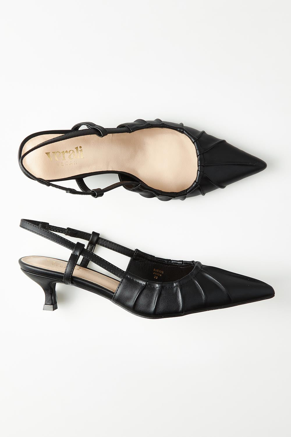 A model wearing size 37 of the Lucius Kitten Heel in colour Black (Black), from the front, showing the whole outfit