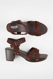 Model Genericm wearing size sample of the Lulu Clog Heel - Chocmicro in colour Chocmicro, from an angle