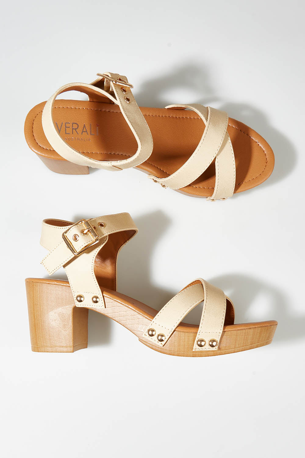 A model wearing size 37 of the Lulu Clog Heel in colour Nude, from the front, showing the whole outfit