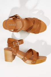 A model wearing size 37 of the Lulu Clog Heel in colour Tansoftee, from the front, showing the whole outfit