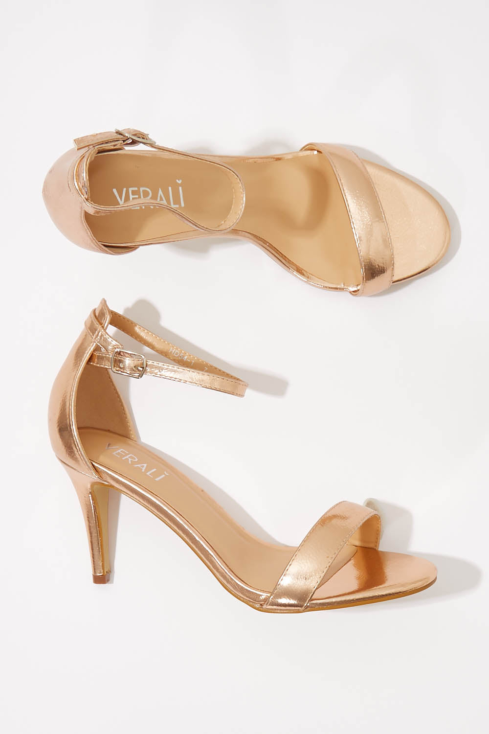 A model wearing size 6 of the Matthew Heel in colour RoseGold (Metallics), from the front, showing the whole outfit