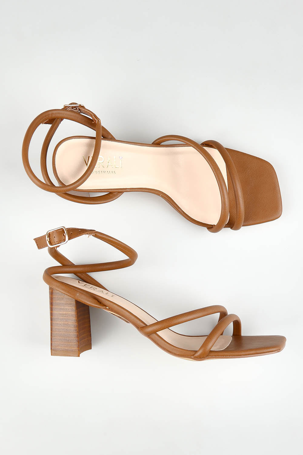A model wearing size 37 of the Nadia Heel in colour Tan, from the front, showing the whole outfit