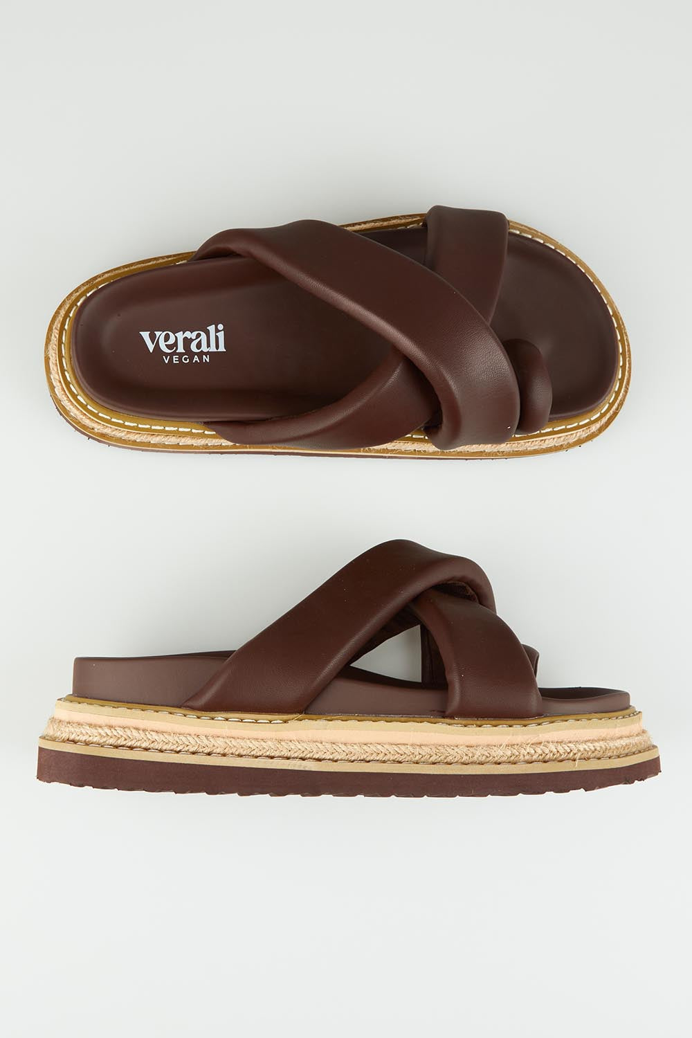 A model wearing size 37 of Thelma Flatform Slide in colour Chocolate, from the front, showing the whole outfit