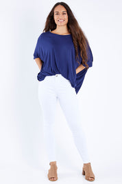 Model Larissa wearing size 10 of the Charlee High Rise Skinny Jean in colour White (White), from the front, showing the whole outfit