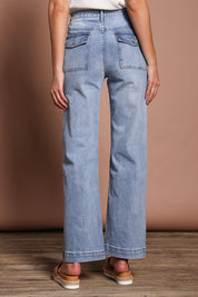 Model Madeline wearing size 9 of the Lou Highin colourWaisted Wide Leg Jean - Lightdenim (Blue), from the back