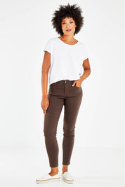 Model Olivia wearing size 10 of the Raven Skinny in colour Chocolate, from the front, showing the whole outfit