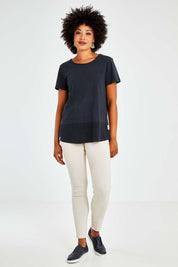Model Olivia wearing size 10 of the Raven Skinny in colour Cream (White), from the front, showing the whole outfit