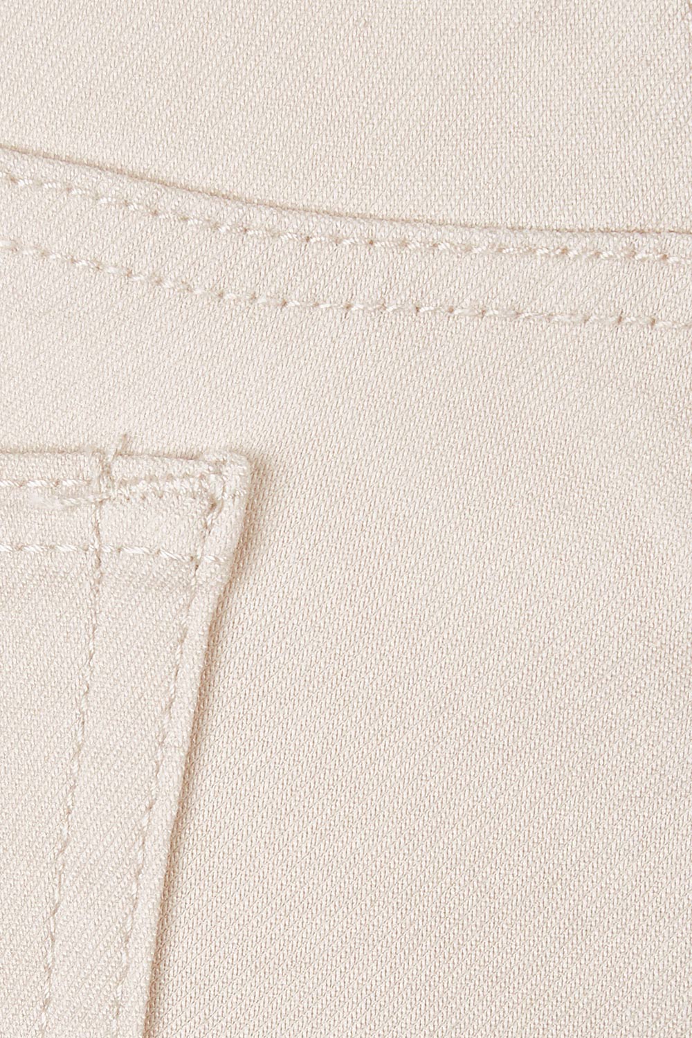 Product shot of the Raven Skinny in colour Cream (White), detail