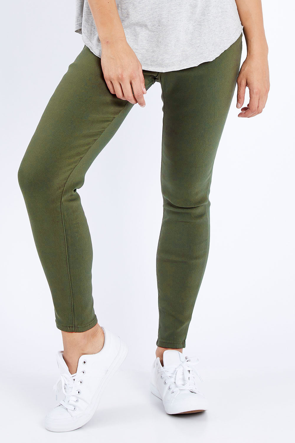 Model Larissa wearing size 10 of the Sutton High Rise Skinny Jean in colour Khaki (Green), from the front, cropped image