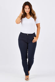 Model Laura wearing size 12 of the Henriette Skinny Jean in colour Navy (Blue), from the front, showing the whole outfit