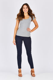 Model Madeline wearing size 10 of the Henriette Skinny Jean in colour Navy (Blue), from the front, showing the whole outfit