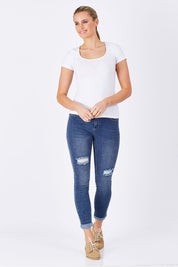 Model Maddy wearing size 10 of the Gwen Skinny in colour Denim (Blue), from the front, showing the whole outfit