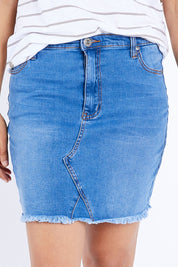 Model Larissa wearing size 10 of the Amy Frayed Hem Denim Skirt in colour Middenim (Blue), from the front, cropped image