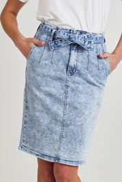 Model Olivia wearing size 10 of the Alexis Highin colourWaisted Skirt - Stonewash (Blue), from the front, cropped image