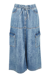 Product shot of the Millie Pull On Denim Skirt in colour Denim (Blue), from the front