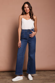 Model Madeline wearing size 9 of the Candice Wide Leg Jean in colour Darkblue (Blue), from the front, showing the whole outfit
