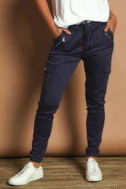 Model Katie wearing size 10 of the Harlow Cargo Jogger in colour Navy (Blue), from the front, cropped image