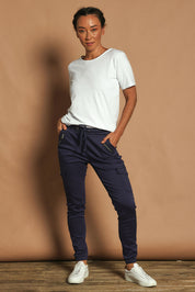 Model Katie wearing size 10 of the Harlow Cargo Jogger in colour Navy (Blue), from the front, showing the whole outfit