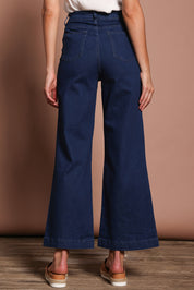 Model Madeline wearing size 9 of the Hayley Highin colourWaisted Wide Leg Jean - Darkdenim (Blue), from the back
