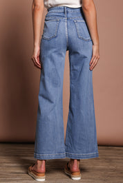 Model Madeline wearing size 9 of the Hayley Highin colourWaisted Wide Leg Jean - Lightdenim (Blue), from the back