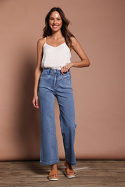 Model Madeline wearing size 9 of the Hayley Highin colourWaisted Wide Leg Jean - Lightdenim (Blue), from the front, showing the whole outfit