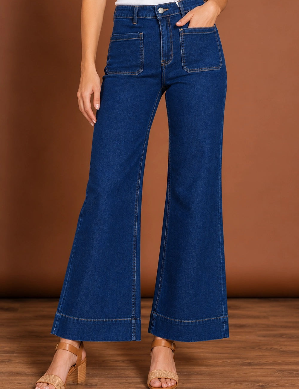 Model Genericm wearing size sample of the Katie High-Waisted Front Pocket Wide Leg Jean - Indigoden in colour Indigoden, in a cropped view