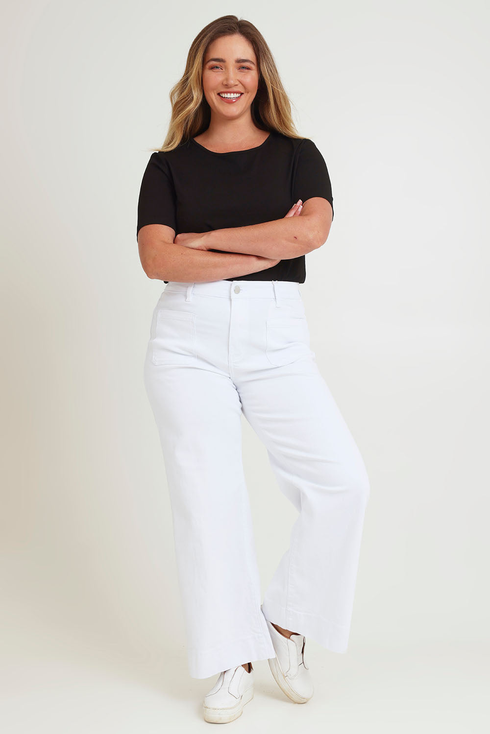 Model Chanel wearing size 16 of the Katie Highin colourWaisted Front Pocket Wide Leg Jean - White (White), from the front, showing the whole outfit