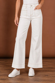Model Genericm wearing size sample of the Katie High-Waisted Front Pocket Wide Leg Jean - Whitstitch in colour Whitstitch, in a cropped view
