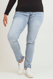 Model Chanel wearing size 16 of the Paige Pull On Jean in colour Lightblue (Blue), from the front, cropped image