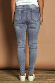 Model Katie wearing size 10 of the River Ribbed Pull On Jean in colour Lightdenim (Blue), from the back