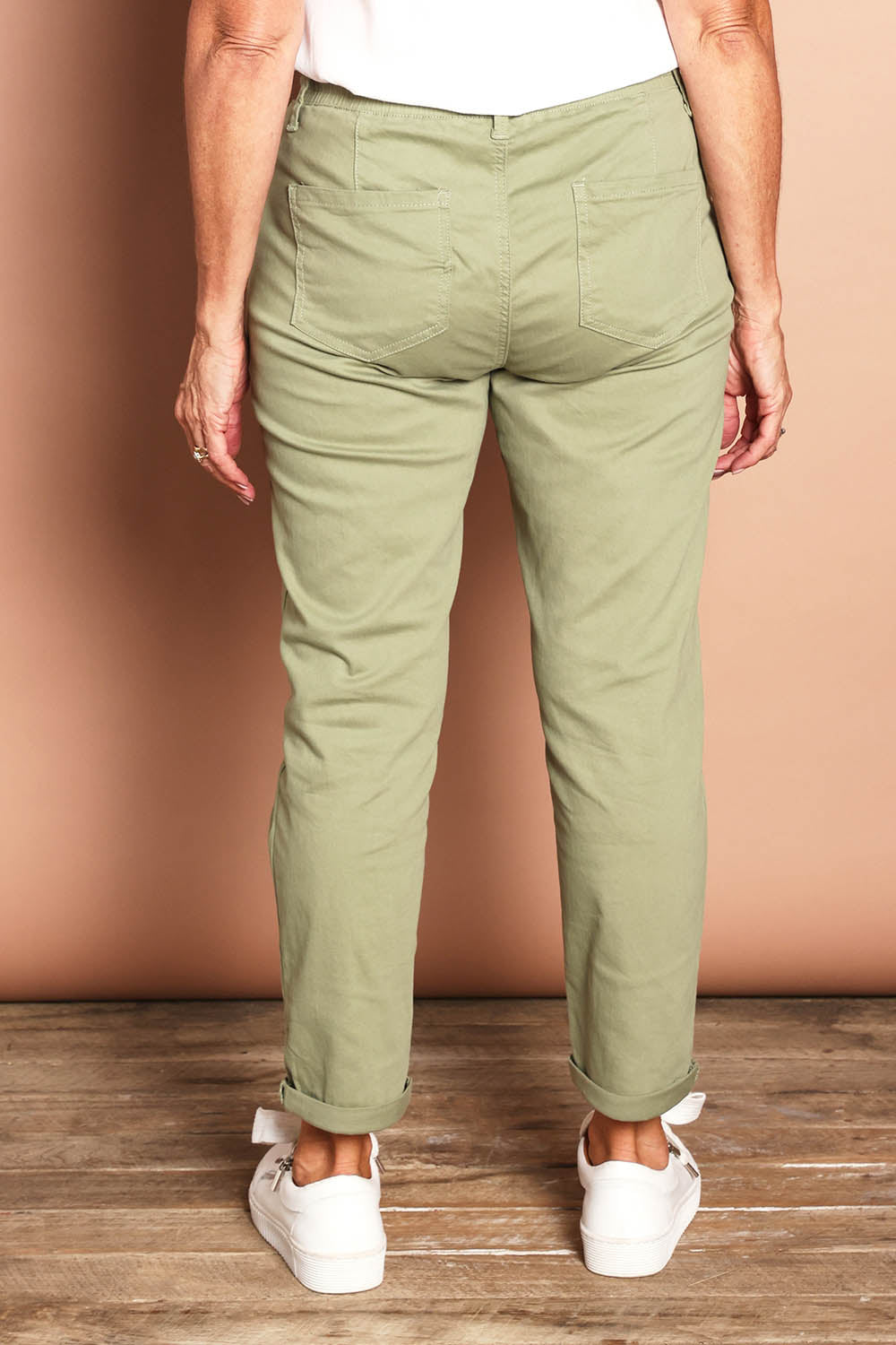 Model Sandy wearing size 10 of the Robin Drawstring Pull On Pant in colour Khaki (Green), from the back