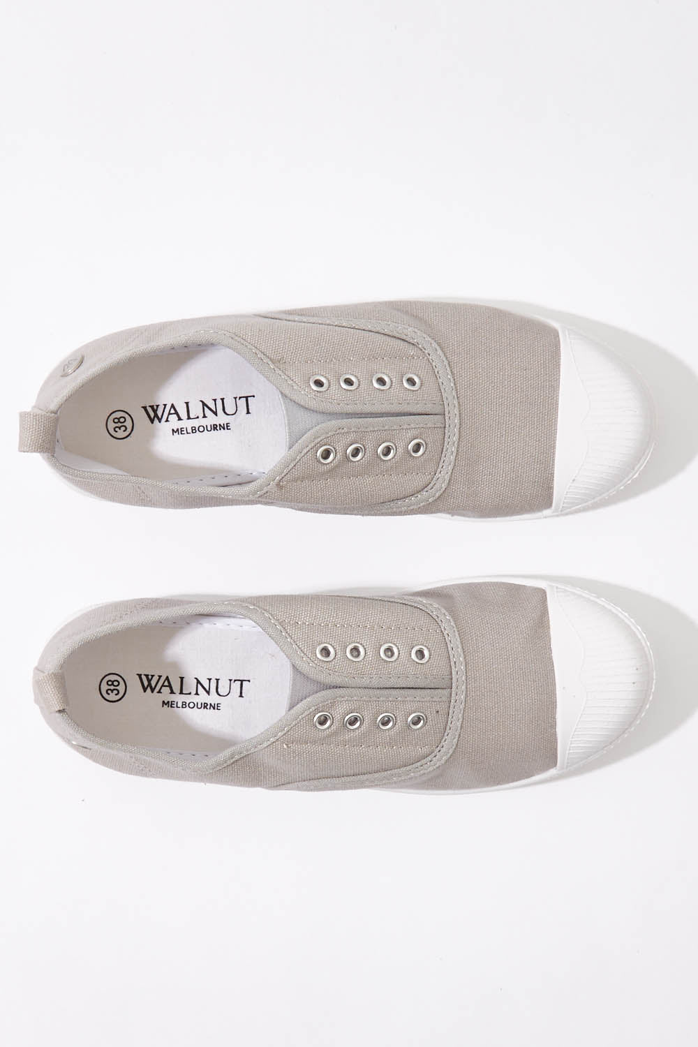 A model wearing size 37 of the Euro Elastic Plimsole in colour Grey (Grey), from the front, showing the whole outfit