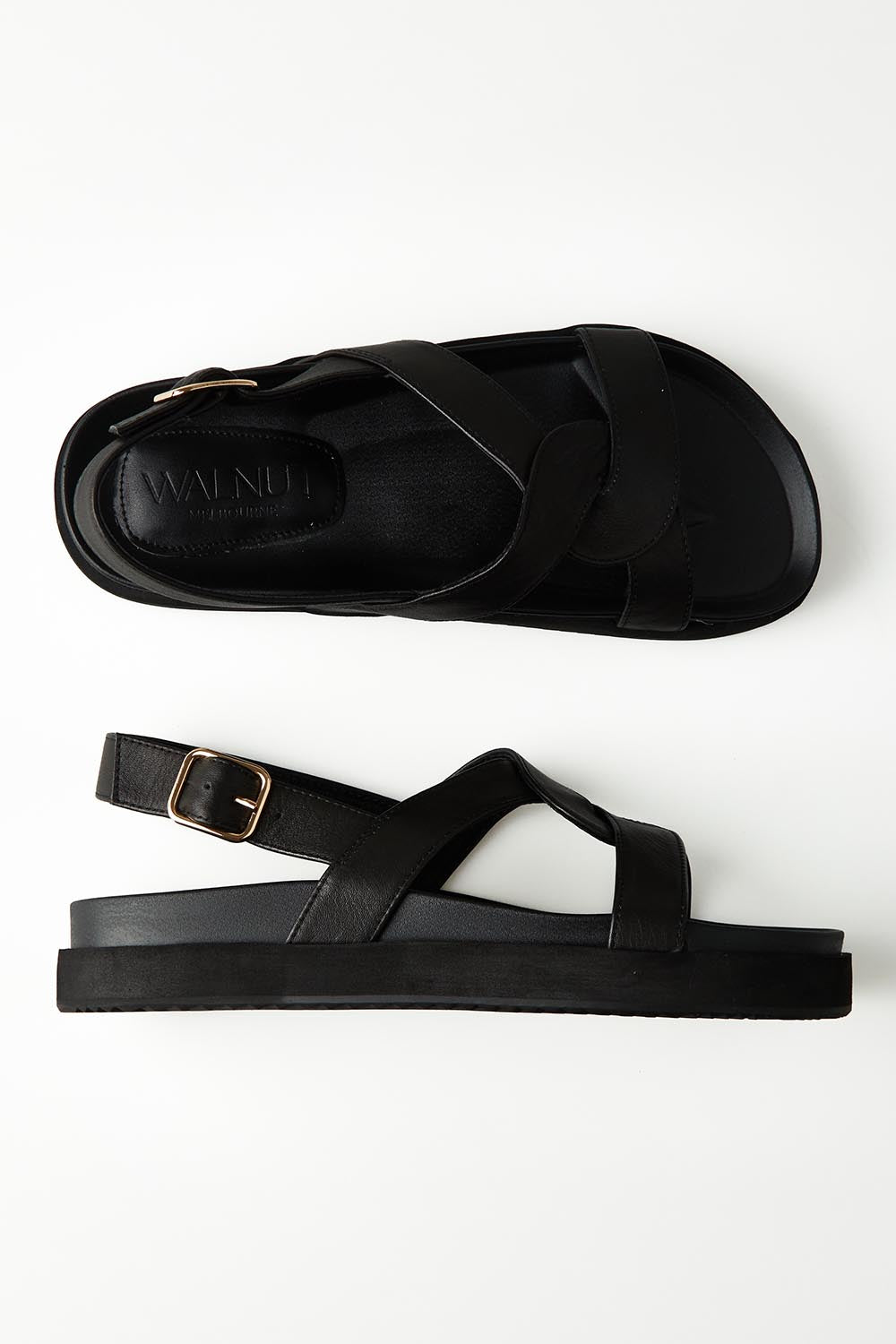 A model wearing size 37 of the Murphy Leather Sandal in colour Black (Black), from the front, showing the whole outfit