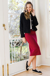 Model Tahlia wearing size 10 of The Ponte Knee Length Pencil Skirt in colour Pomegranat (Red), from the front, showing the whole outfit