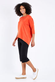 Model Schanez wearing size S of the 3/4 Bamboo Pants in colour Black (Black), from the front, showing the whole outfit