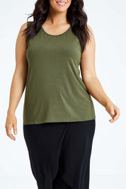 Model Laura wearing size L of the Drape Bamboo Cami in colour Olive (Green), from the front, cropped image