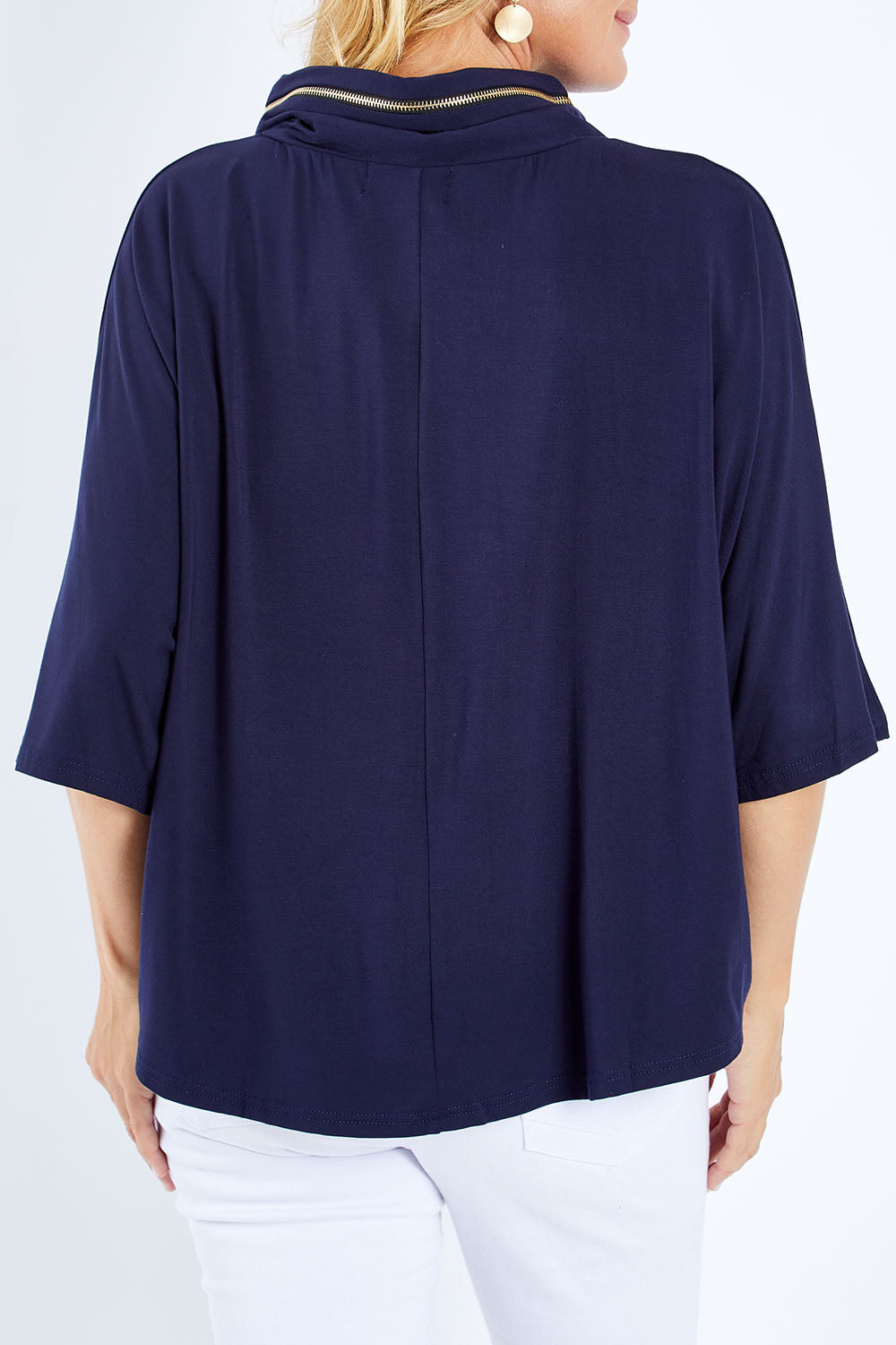 Model Bianca wearing size S of the Zip Neck Bat Wing Tunic in colour Dnavy (Blue), from the back