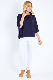 Model Bianca wearing size S of the Zip Neck Bat Wing Tunic in colour Dnavy (Blue), from the front, showing the whole outfit