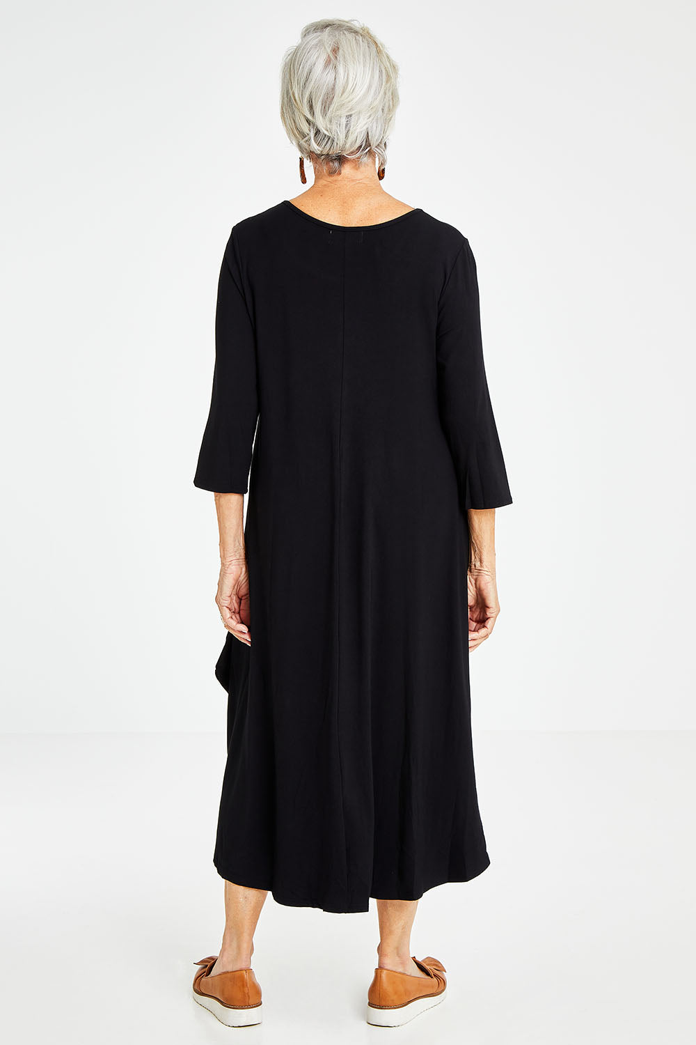 Model Elise wearing size S of the 3/4 Sleeve Bamboo Maxi Dress in colour Black (Black), from the back